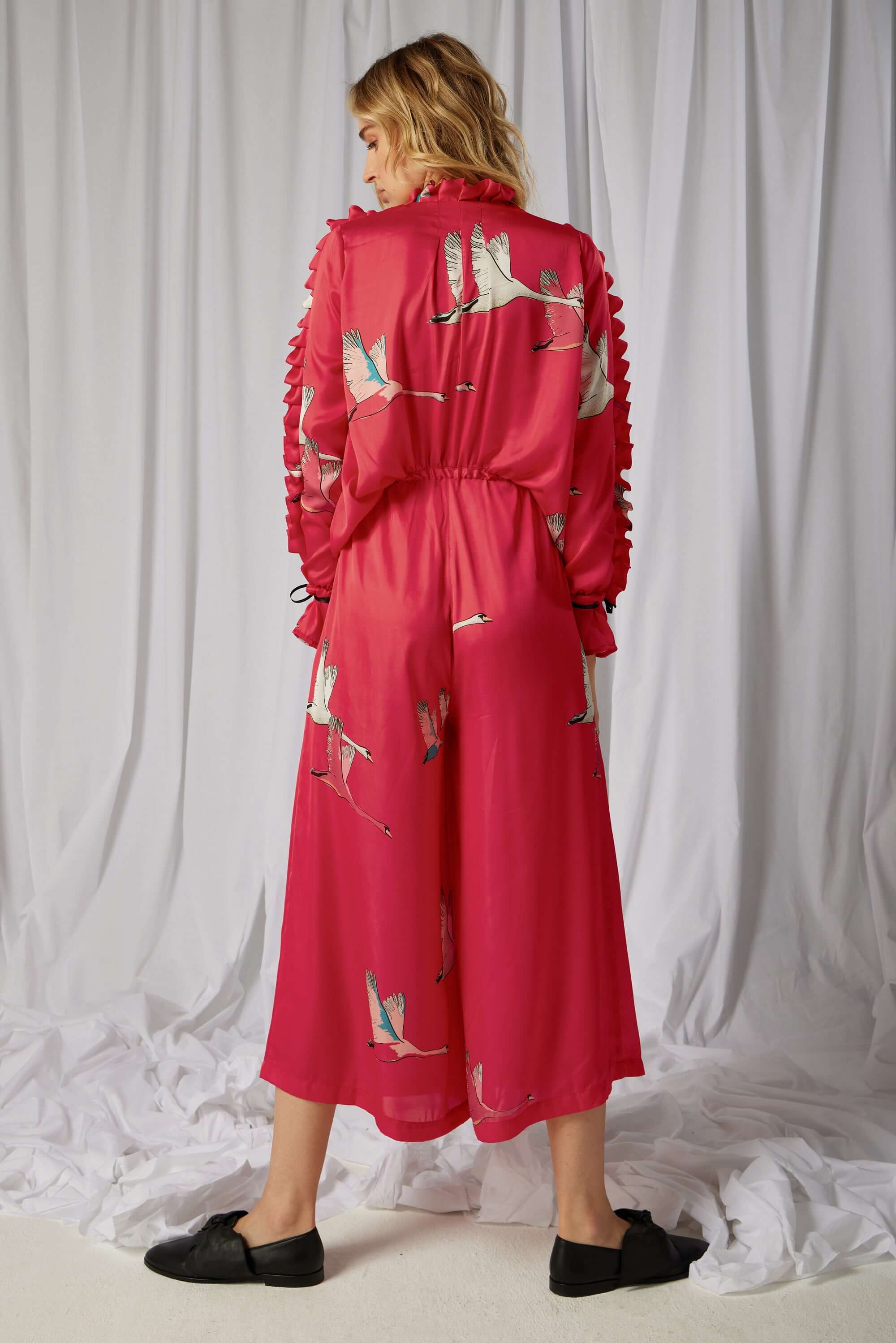 Gil jumpsuit in pink Swan print