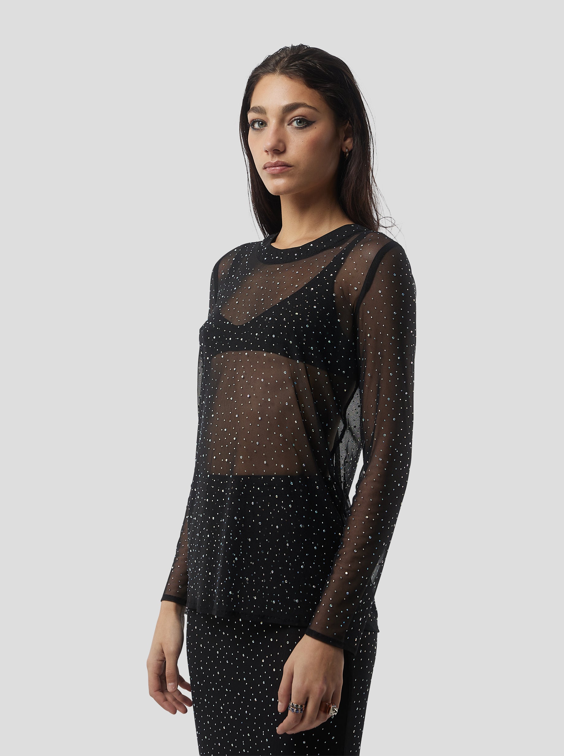 Cloud Top in Fragmented Black Soft Mesh