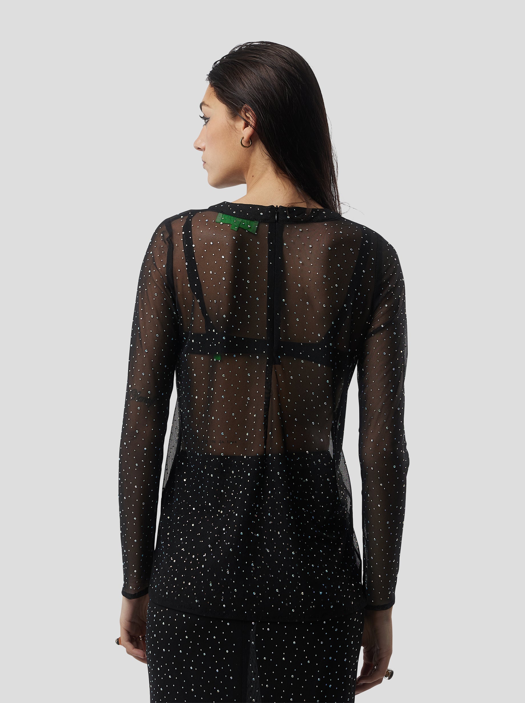 Cloud Top in Fragmented Black Soft Mesh